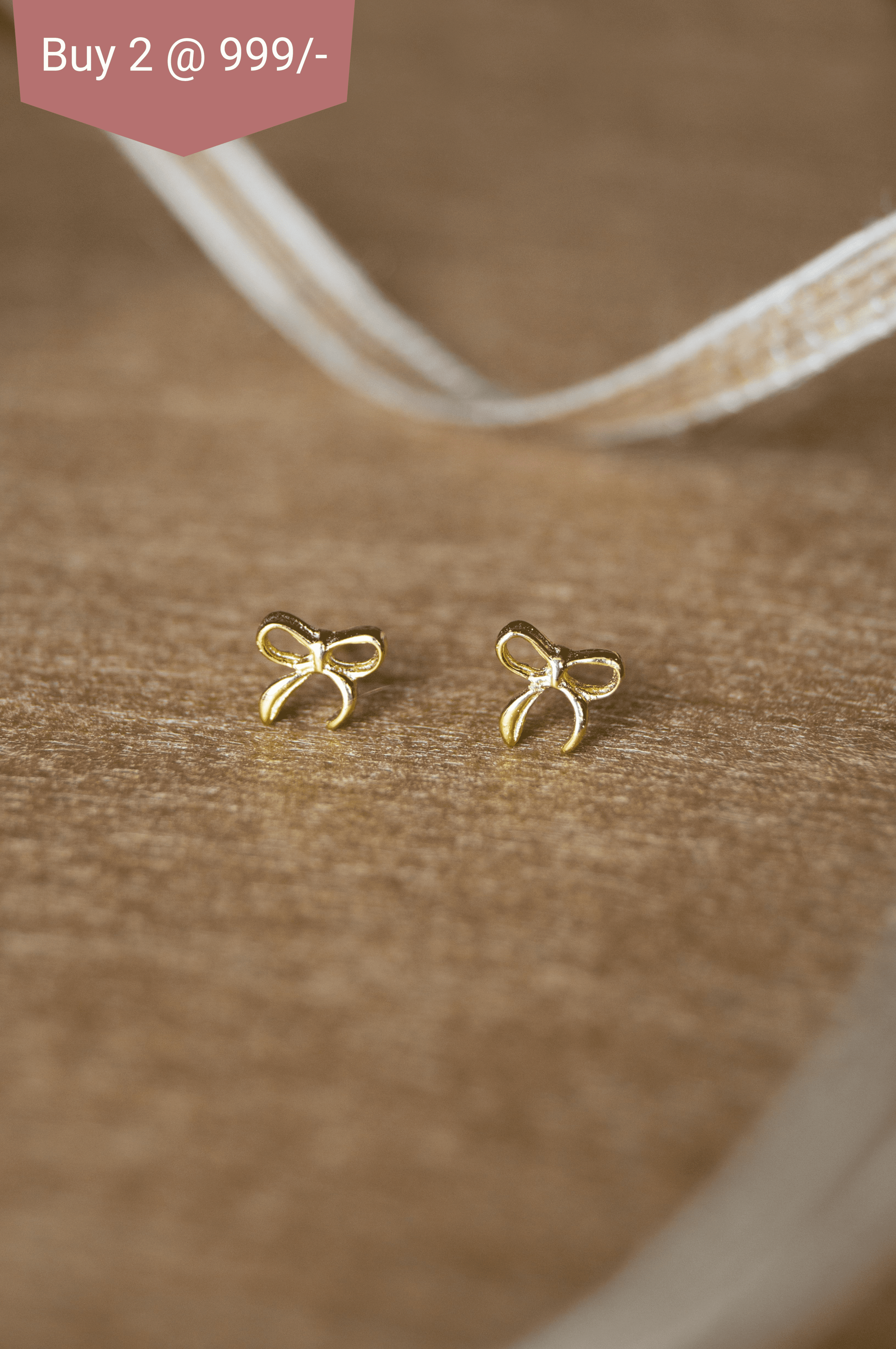 Gold bow 2025 stud earrings