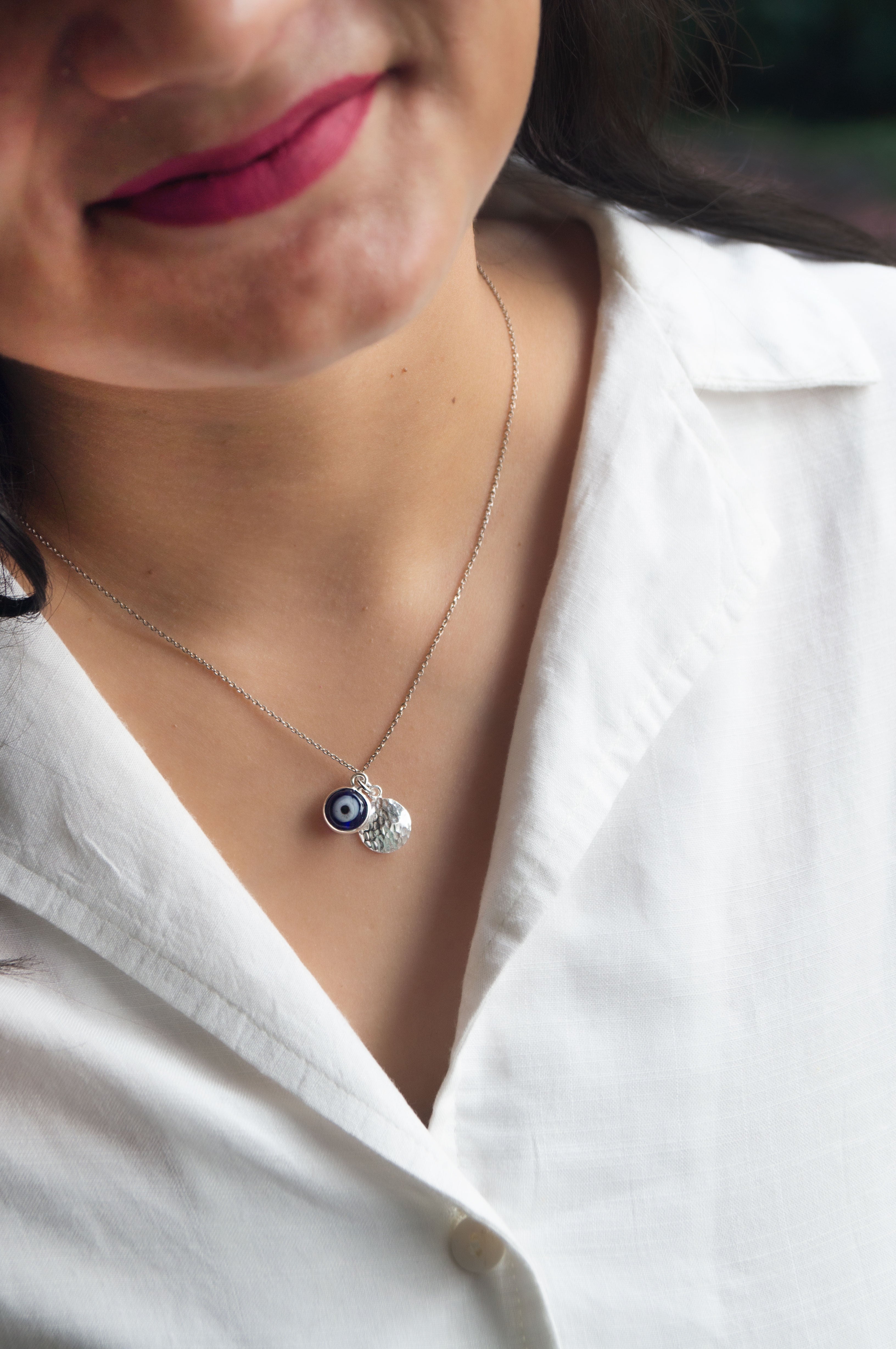 Silver evil eye charm deals
