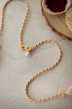 Infinity Love With Pearl Gold Plated Sterling Silver Charm Rakhi