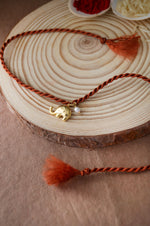 Cute Elephant With Pearl Gold Plated Sterling Silver Charm Rakhi