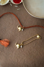 Cute Elephant With Pearl Gold Plated Sterling Silver Rakhi With Lumba Combo