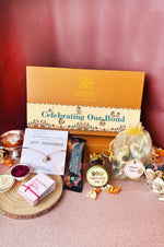 Celebrating Our Bond Silver Rakhi Gift Hamper