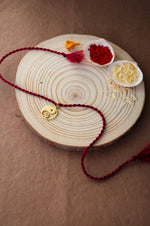 Yin And Yang With Ganesha Gold Plated Sterling Silver Charm Rakhi